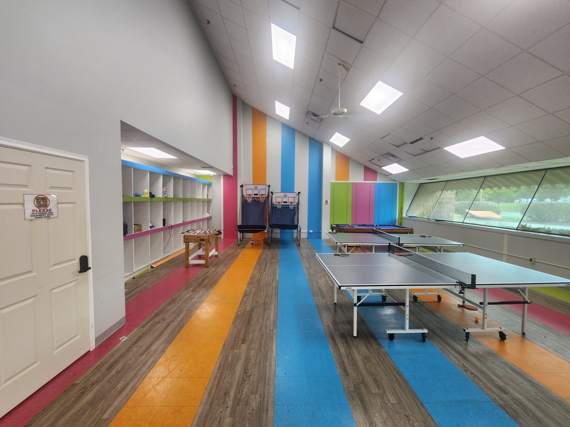 BrightSite game room with a pool table and table tennis